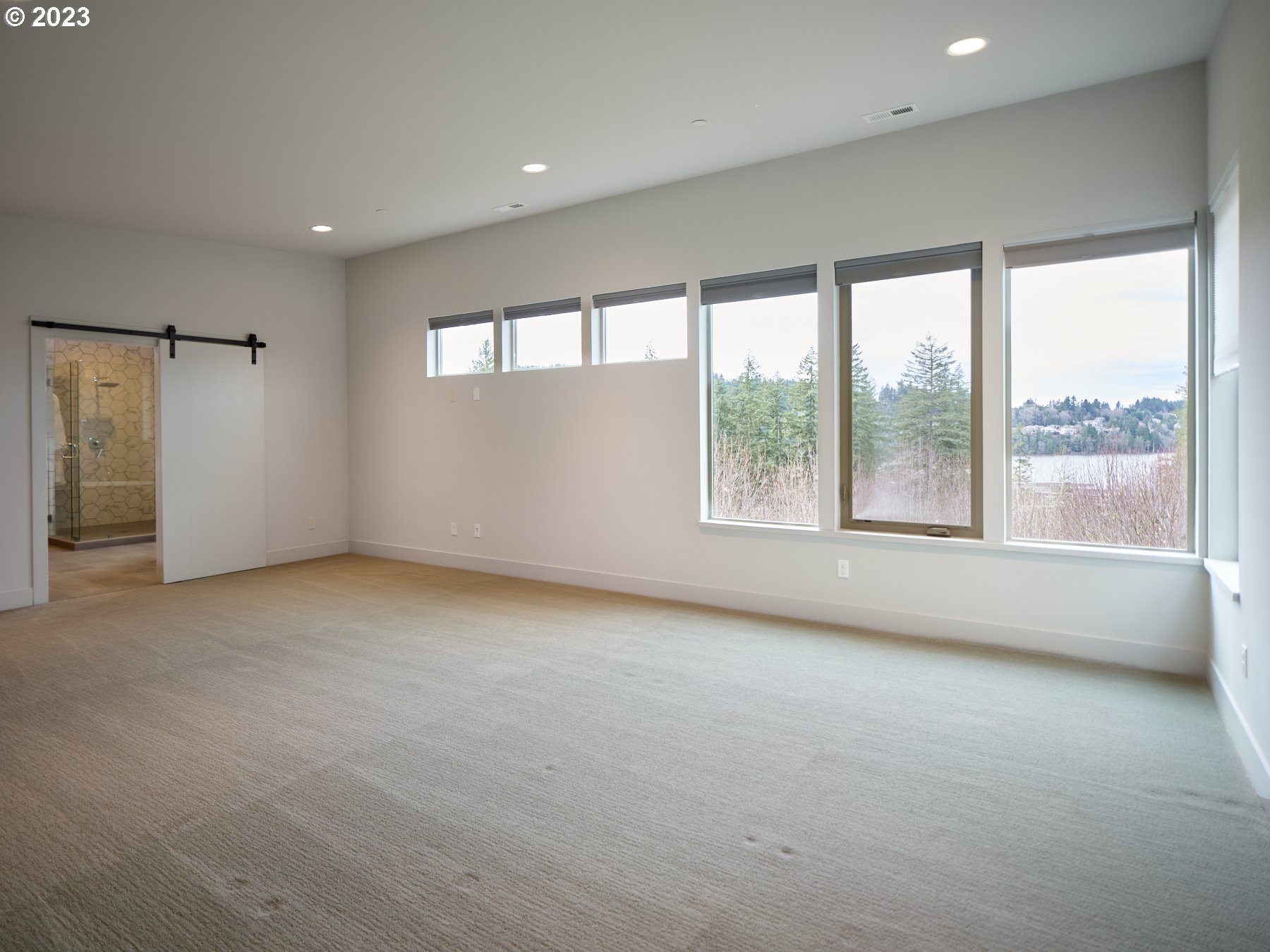 4633 North Adams Street Camas, WA 98607 - Photo 33 of 40 a view of an empty room with a window