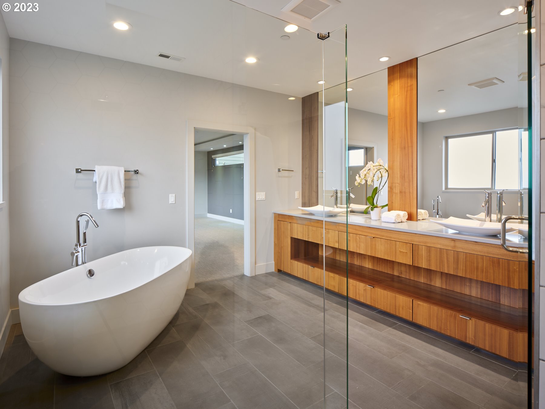 4633 North Adams Street Camas, WA 98607 - Photo 36 of 40 a bathroom with a double vanity sink tub and a mirror
