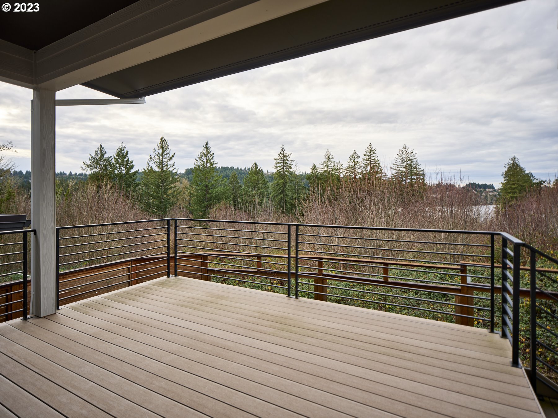 4633 North Adams Street Camas, WA 98607 - Photo 37 of 40 a view of a roof deck with wooden floor and city view