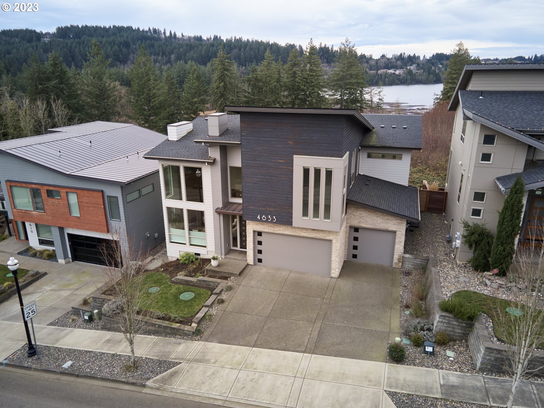 4633 North Adams Street Camas, WA 98607 - Photo 4 of 40 a front view of a house with a garden