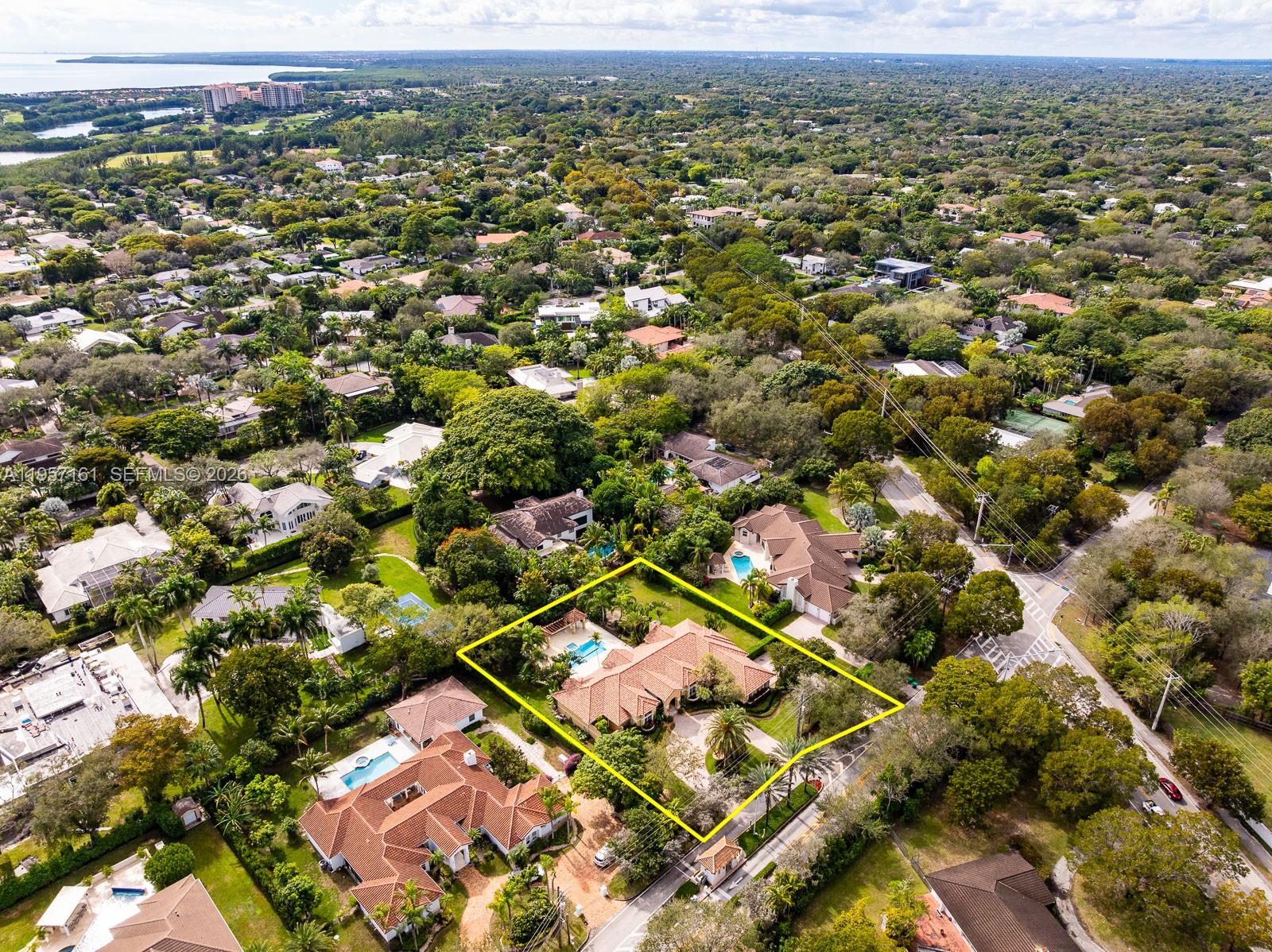 5770 Southwest 128th Street Pinecrest, FL 33156 - Photo 34 of 37 an aerial view of a city