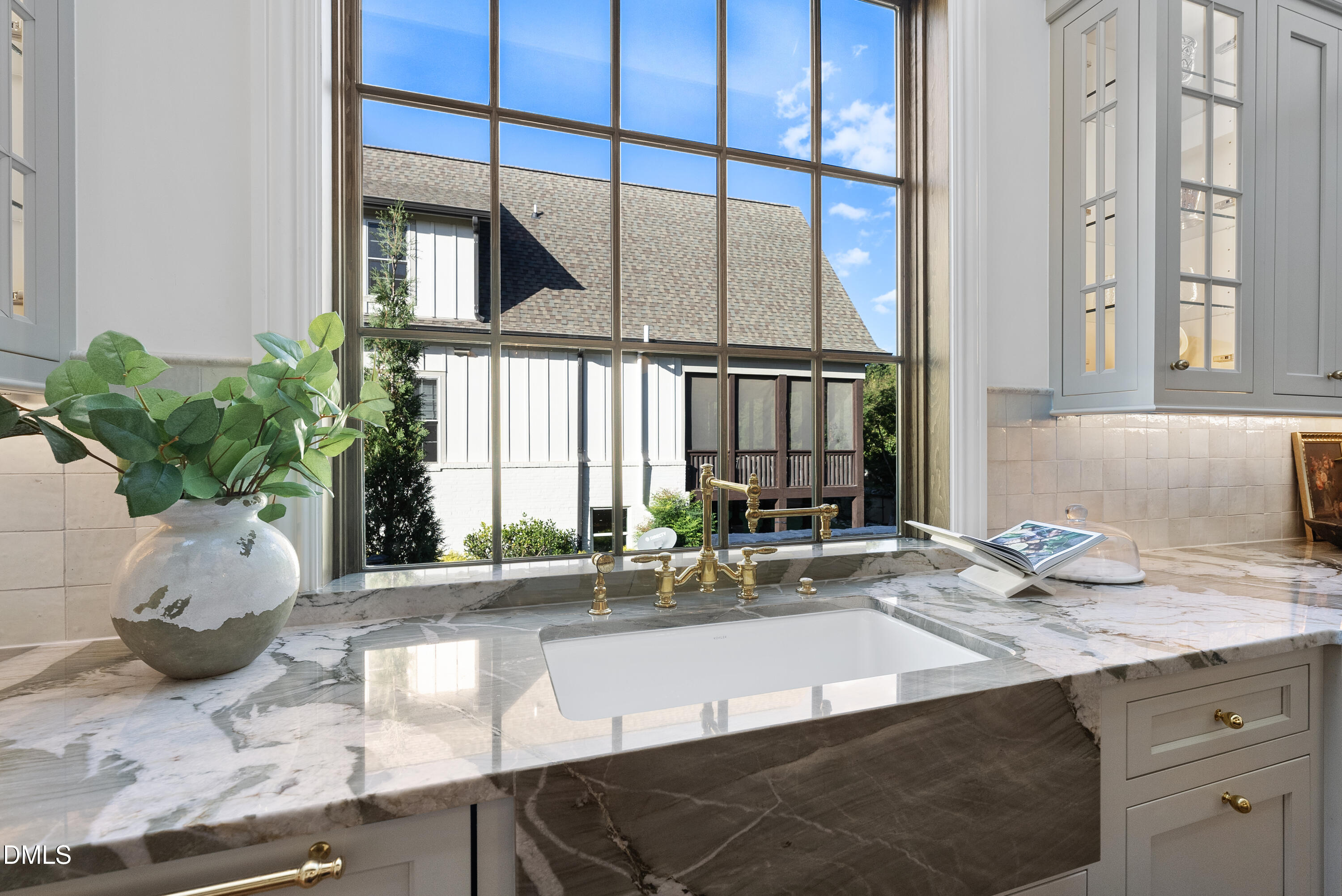 2128 Ridge Road Raleigh, NC 27607 - Photo 33 of 100 a kitchen with a sink and large window
