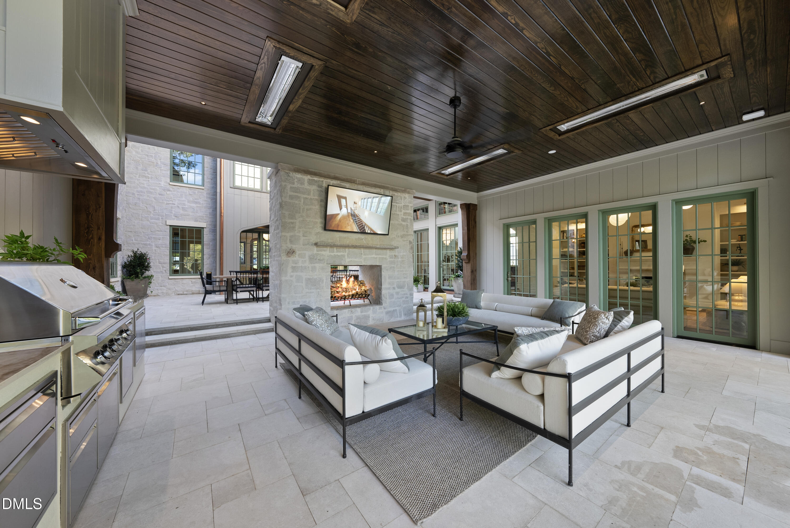 2128 Ridge Road Raleigh, NC 27607 - Photo 50 of 100 a living room with furniture and a chandelier