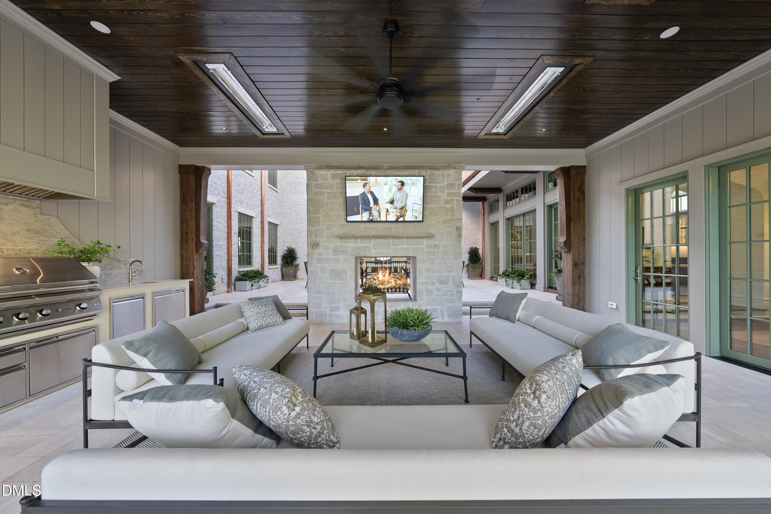 2128 Ridge Road Raleigh, NC 27607 - Photo 51 of 100 a living room with furniture and a ceiling fan