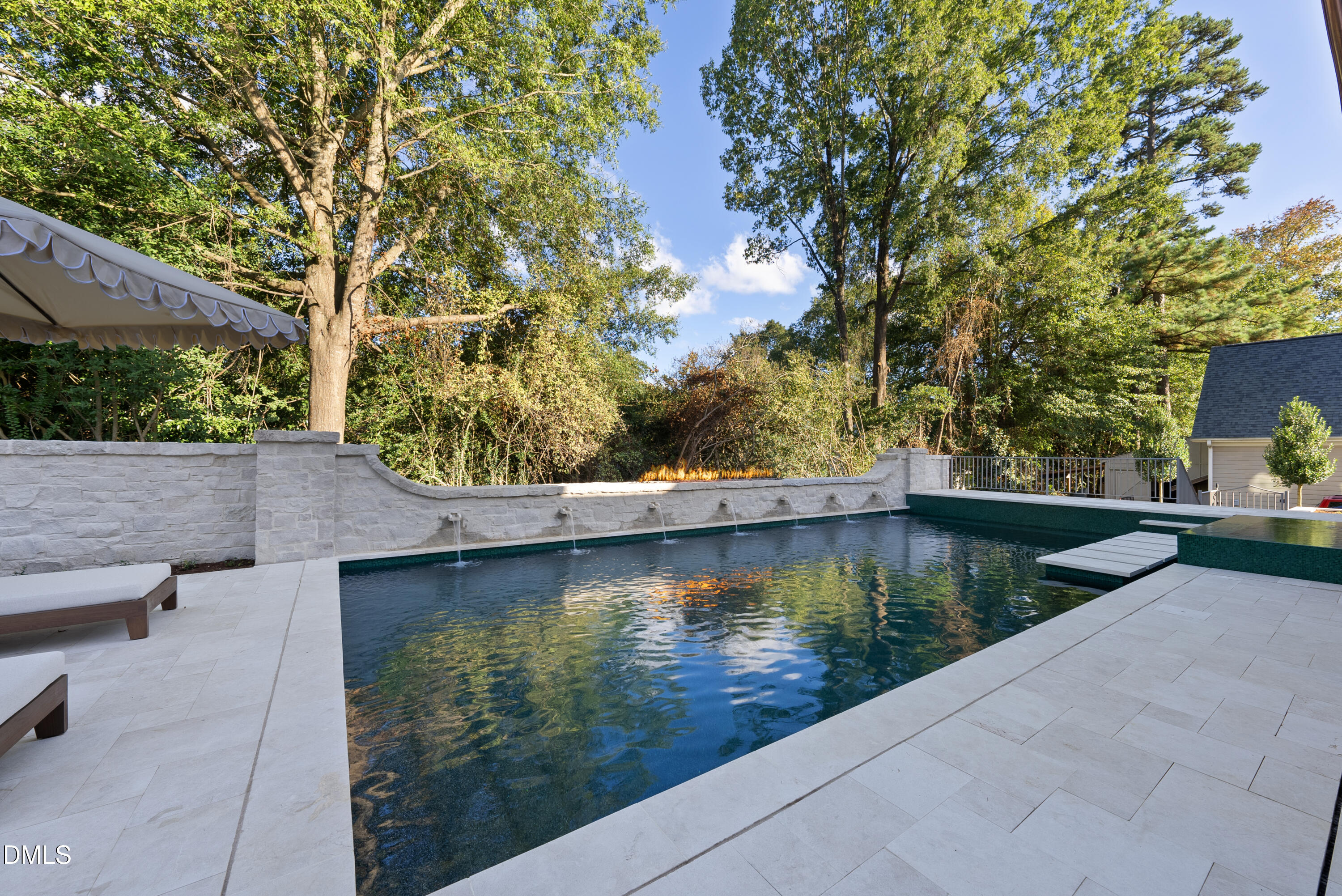 2128 Ridge Road Raleigh, NC 27607 - Photo 58 of 100 a view of a swimming pool with a yard