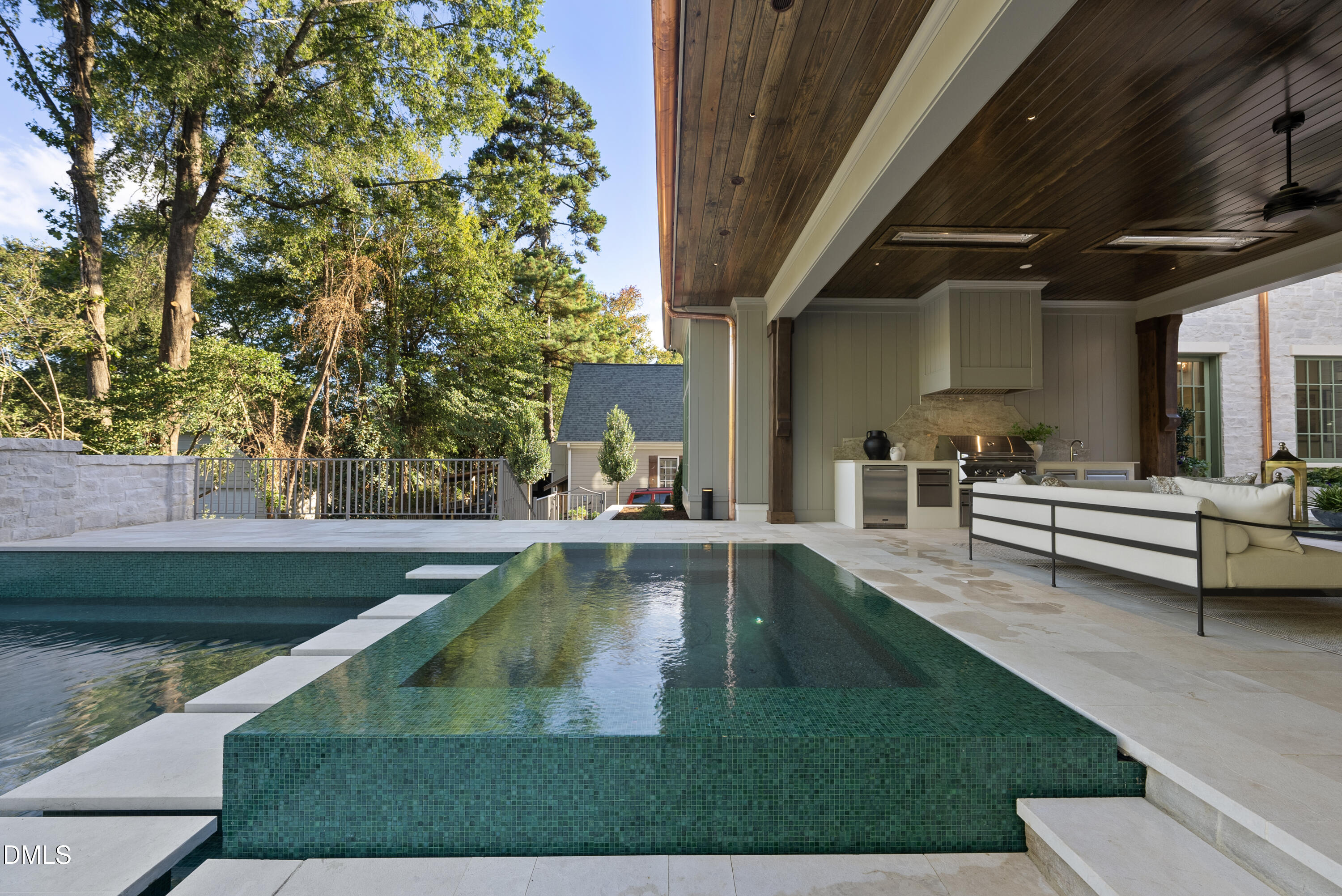 2128 Ridge Road Raleigh, NC 27607 - Photo 59 of 100 a view of a backyard with swimming pool