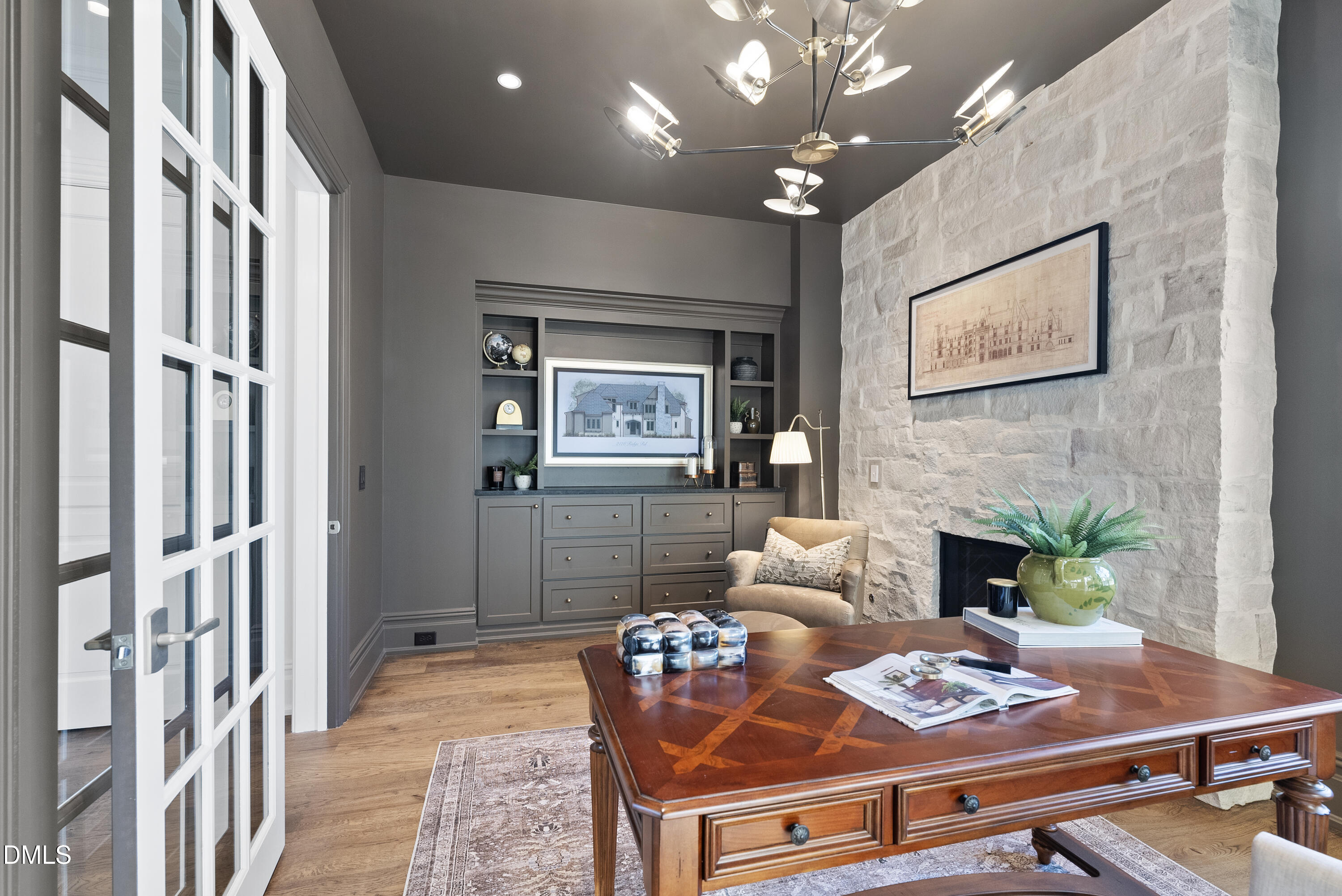 2128 Ridge Road Raleigh, NC 27607 - Photo 64 of 100 a living room with furniture and a fireplace