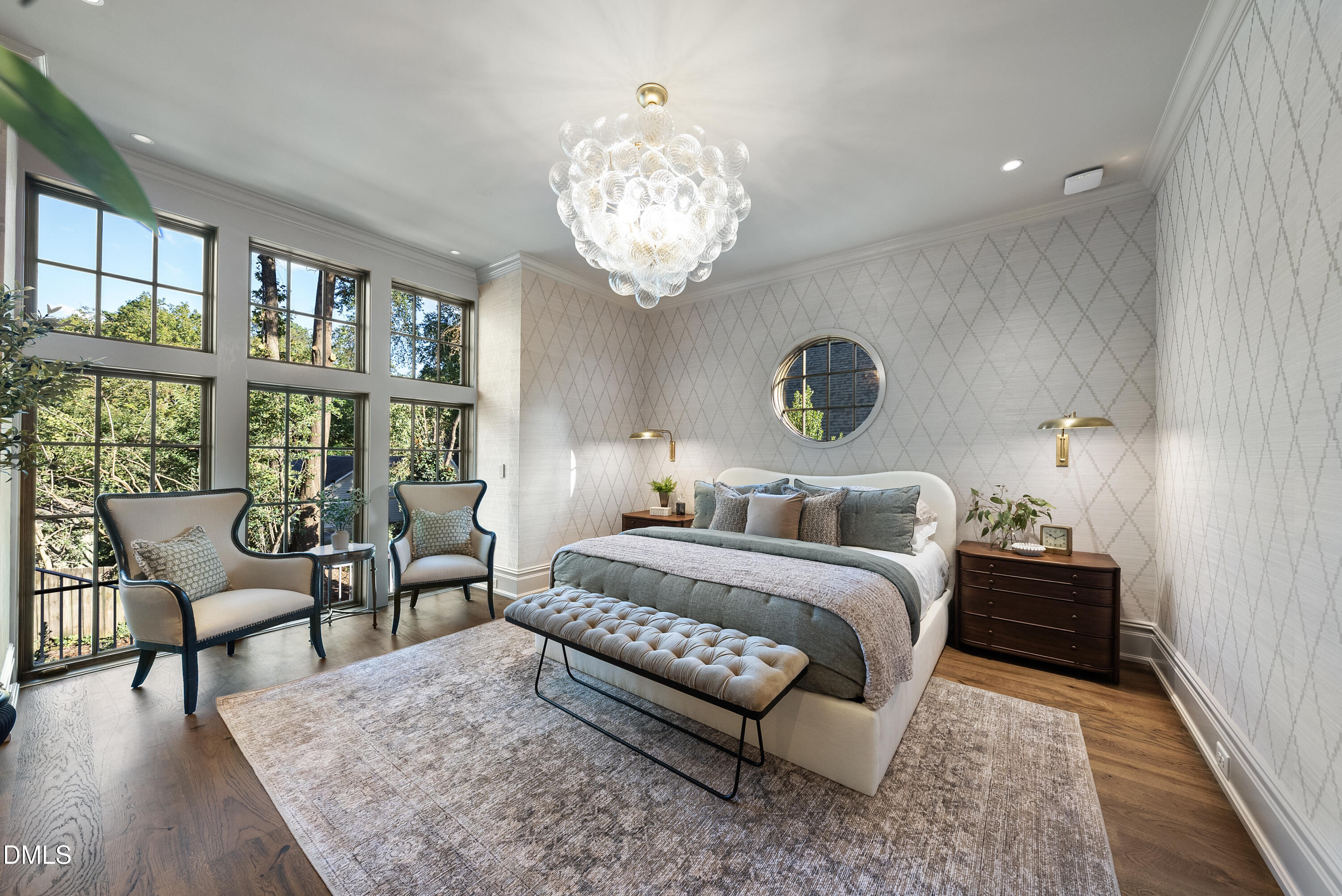 2128 Ridge Road Raleigh, NC 27607 - Photo 75 of 100 a bedroom with a bed and a chandelier