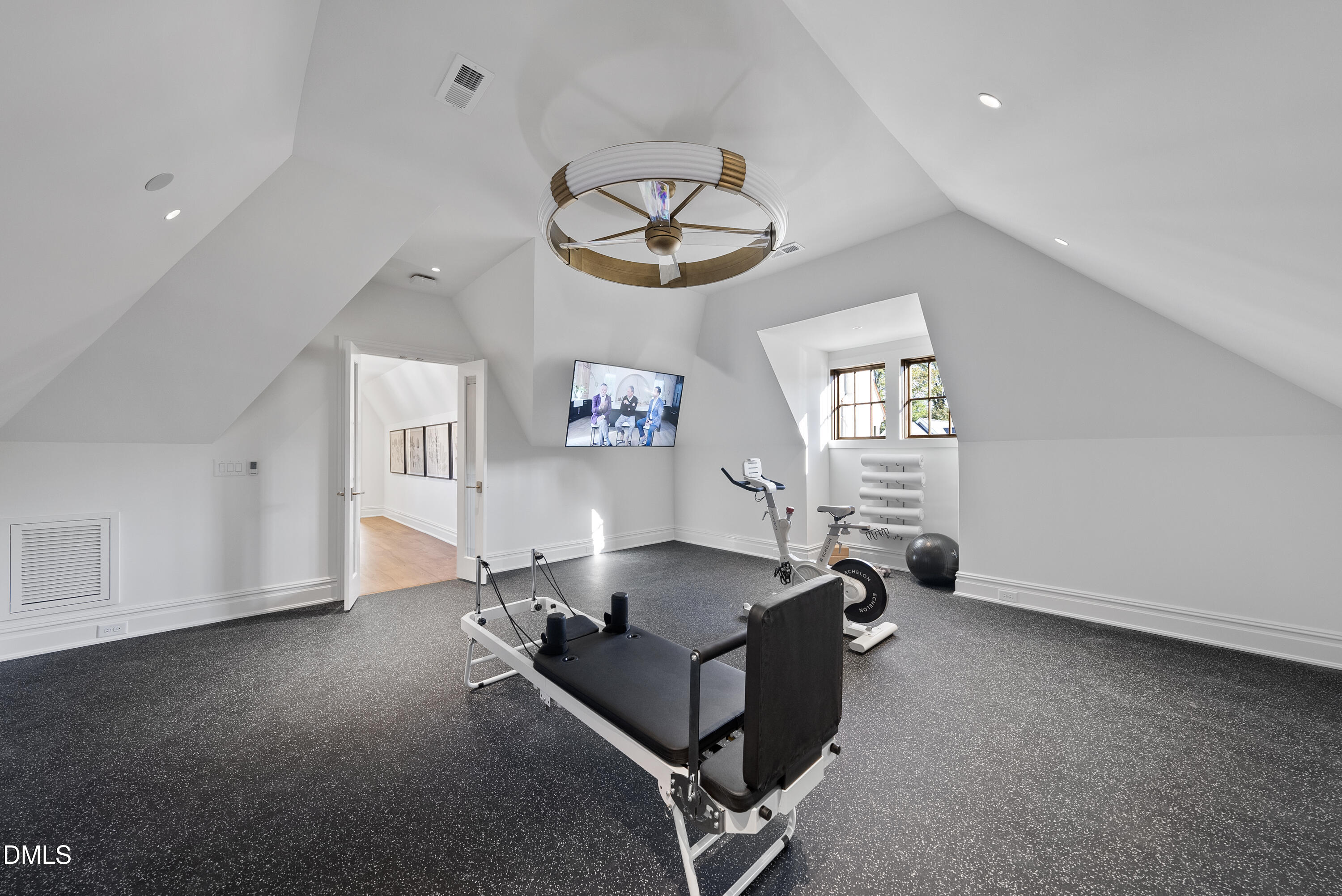 2128 Ridge Road Raleigh, NC 27607 - Photo 90 of 100 a room with gym equipment and a window