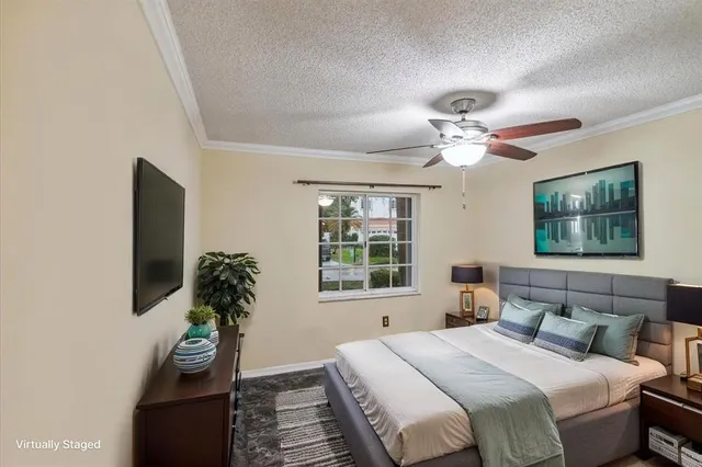 a view of a patio with couches chairs and potted plants