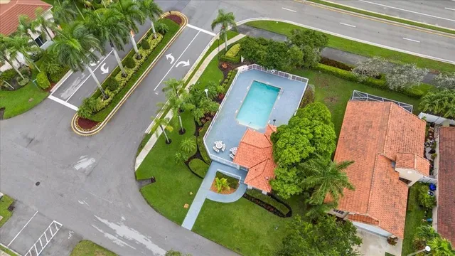 a view of a swimming pool with a patio