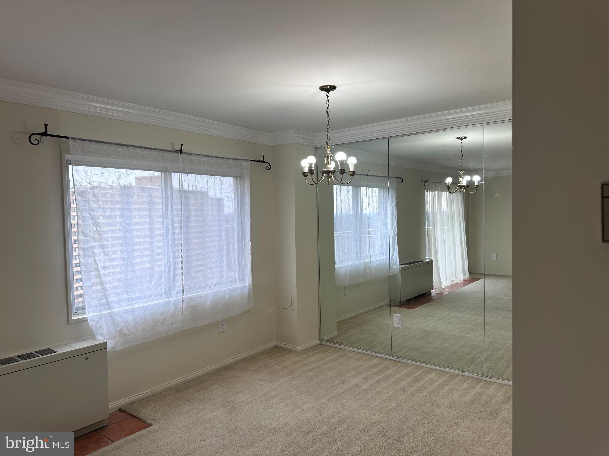 1111 University Boulevard West, Unit 1406A Silver Spring, MD 20902 - Photo 4 of 14 Bright and airy space with mirrored elegance.