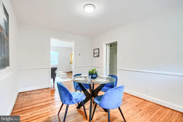 a bedroom with a bed and a table