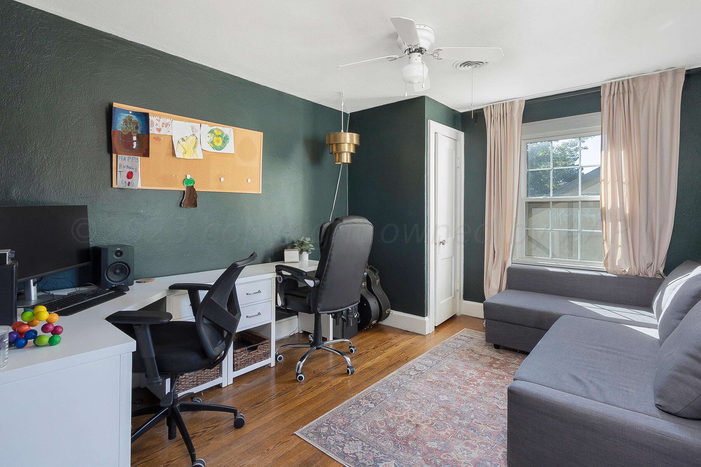 2102 South Hayden Street Amarillo, TX 79109 - Photo 28 of 33 a workspace with furniture and a window