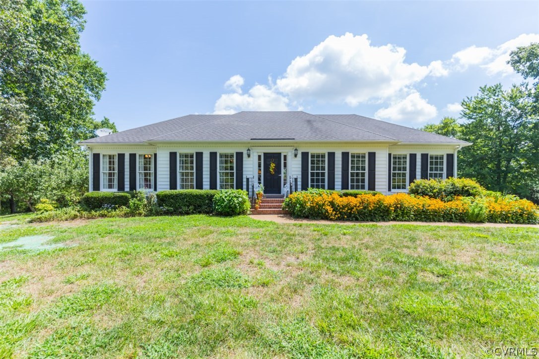 4829 Wakema Road West Point, VA 23181 - Photo 2 of 36 a view of a house with a backyard