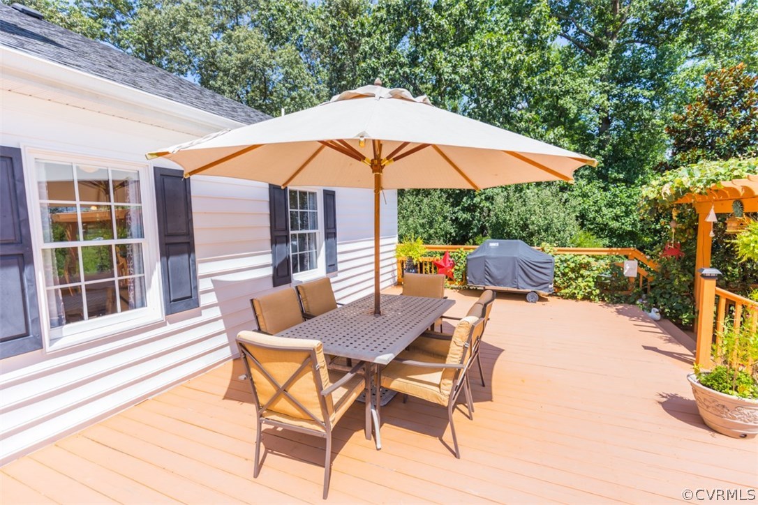 4829 Wakema Road West Point, VA 23181 - Photo 21 of 36 an outdoor space with furniture and umbrella