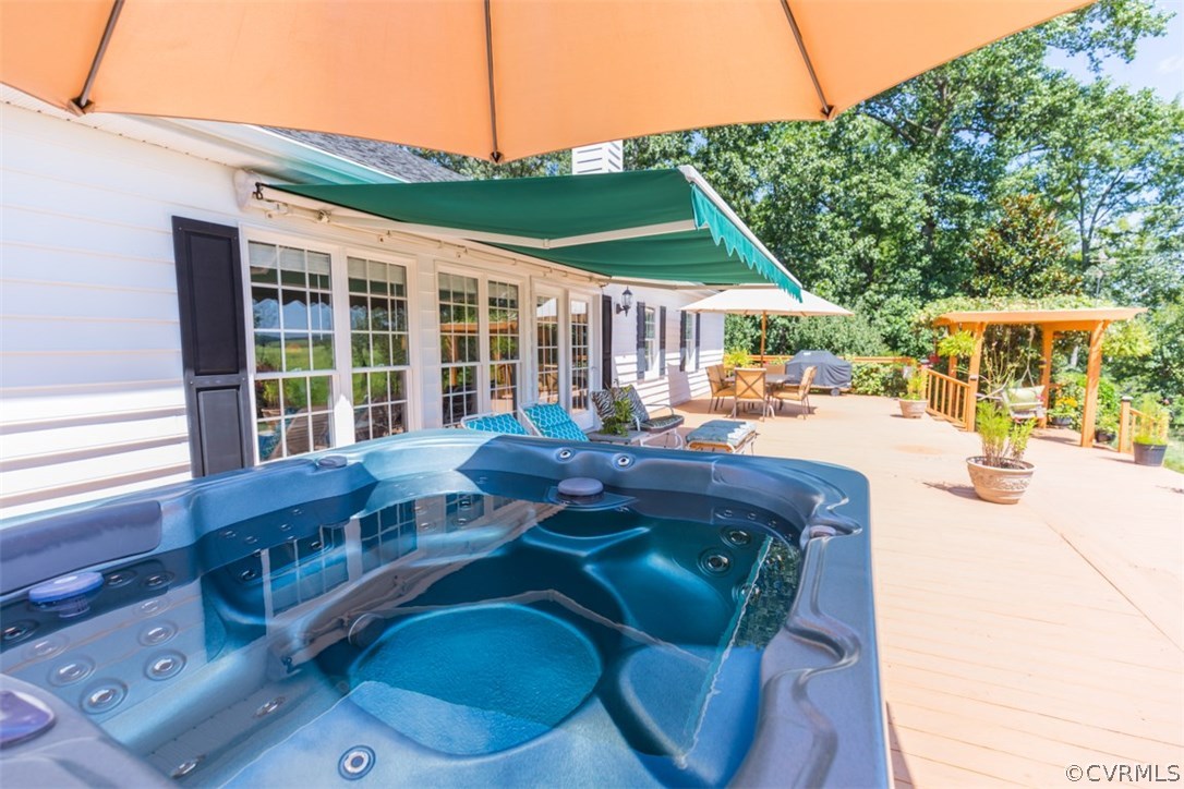 4829 Wakema Road West Point, VA 23181 - Photo 24 of 36 a backyard of a house with outdoor seating