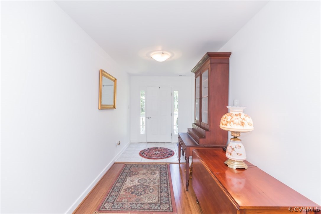 4829 Wakema Road West Point, VA 23181 - Photo 5 of 36 a living room with furniture and a table