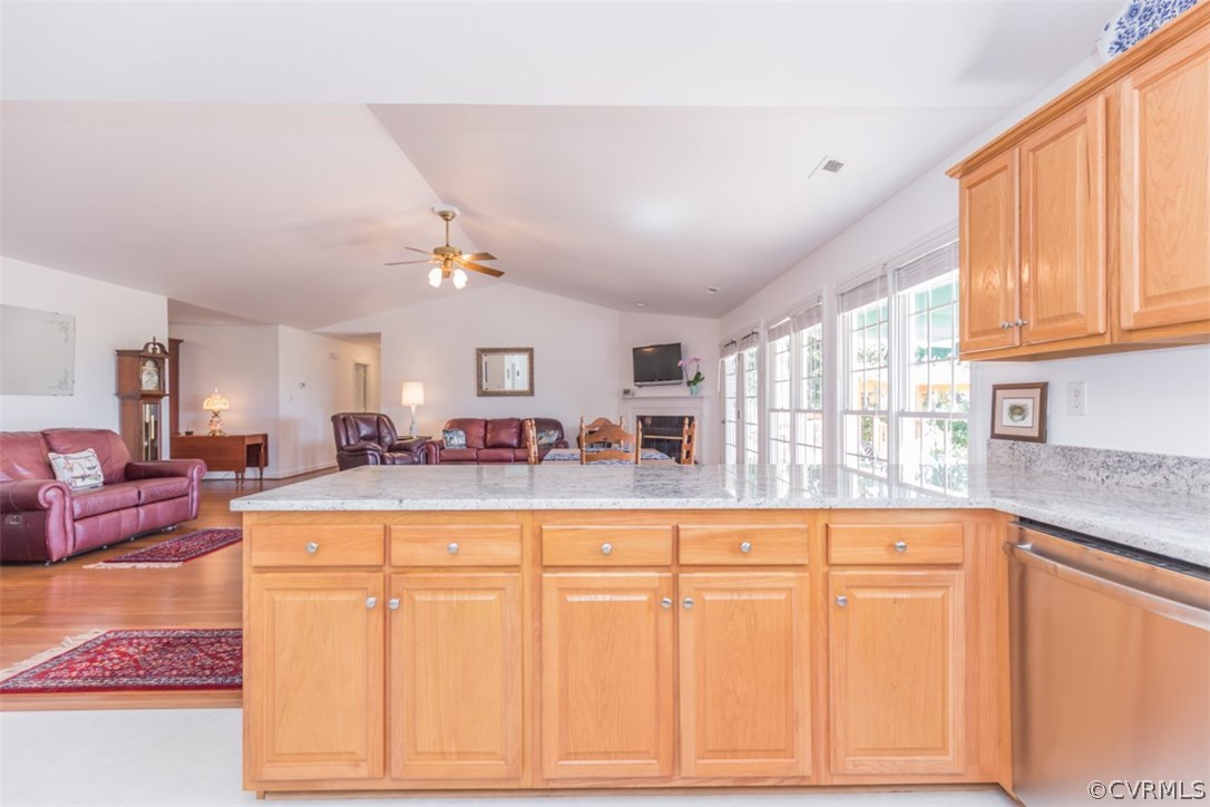 4829 Wakema Road West Point, VA 23181 - Photo 9 of 36 a living room with kitchen island furniture and a window