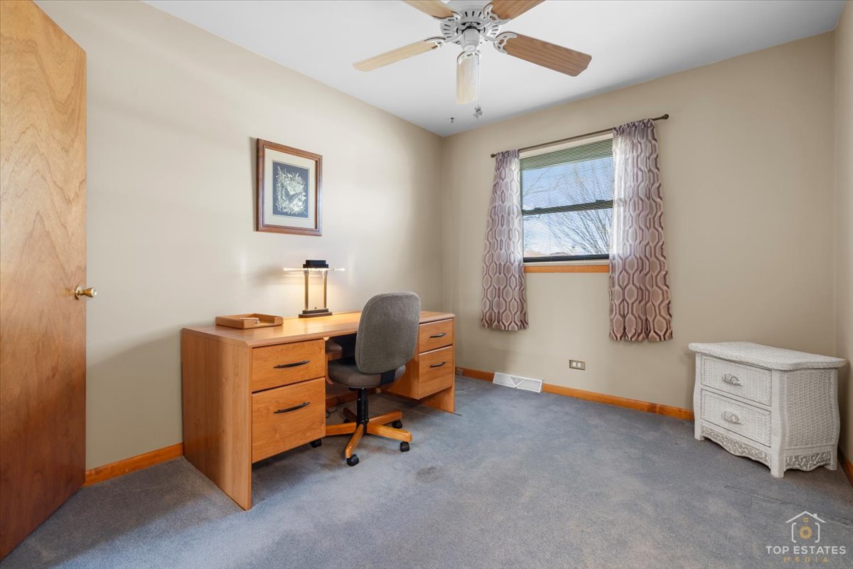 216 Evergreen Street Addison, IL 60101 - Photo 22 of 43 a view of workspace with windows