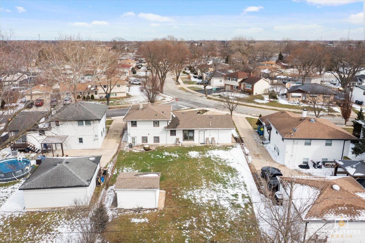 216 Evergreen Street Addison, IL 60101 - Photo 36 of 43 an aerial view of residential houses with city view