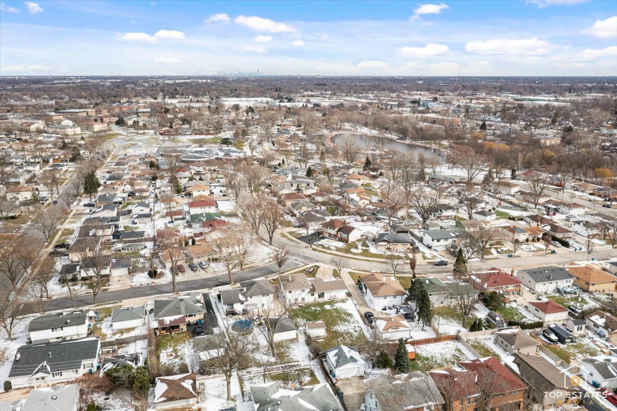 216 Evergreen Street Addison, IL 60101 - Photo 37 of 43 an aerial view of residential building with green space