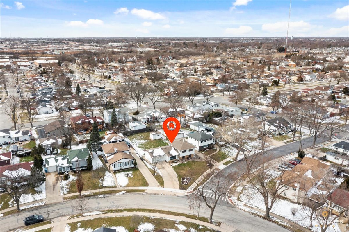 216 Evergreen Street Addison, IL 60101 - Photo 5 of 43 an aerial view of multiple house