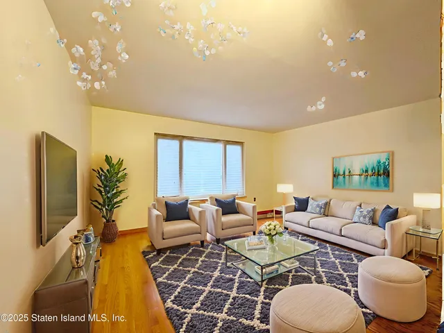 a workspace with furniture and book shelf