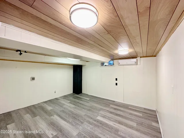 a view of a backyard with sitting area