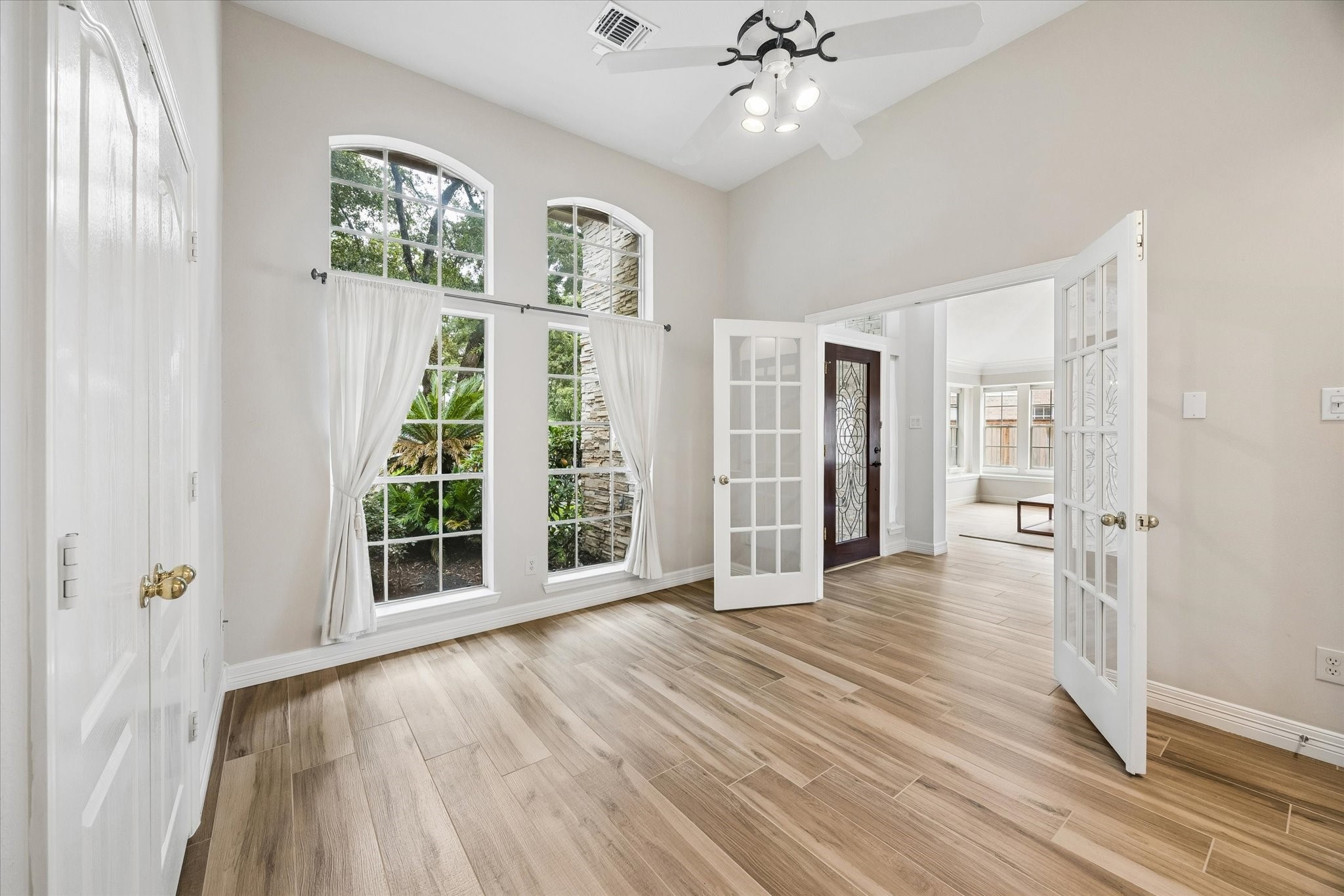 5306 Summerland Ridge Court Houston, TX 77041 - Photo 24 of 33 wooden floor in an empty room with a window