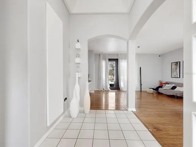 a view of a livingroom and a ocean view