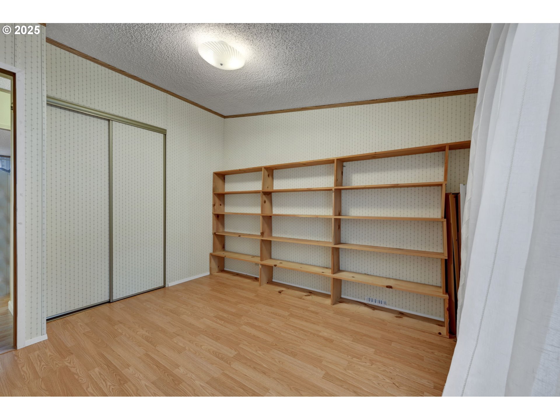 1120 West Fairview Drive, Unit 3 Springfield, OR 97477 - Photo 14 of 21 a view of an empty room with a closet