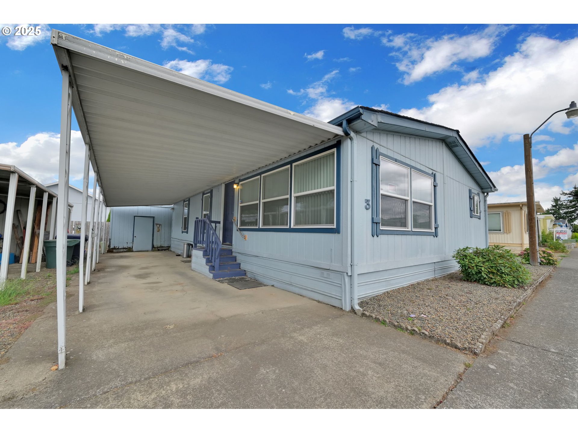 1120 West Fairview Drive, Unit 3 Springfield, OR 97477 - Photo 20 of 21 a view of a house with a garage