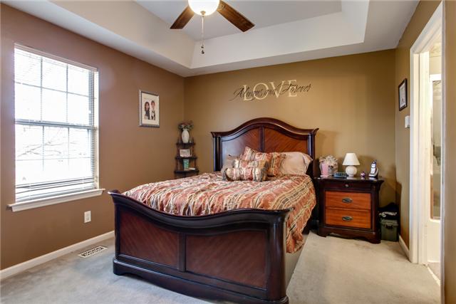 3479 Beckwith Road Mount Juliet, TN 37122 - Photo 10 of 20 a bed sitting in a bedroom next to a window