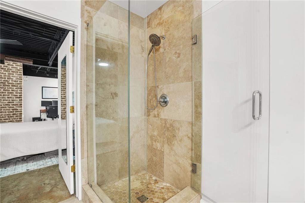 5434 Peachtree Road, Unit 119 Atlanta, GA 30341 - Photo 27 of 44 a bathroom with a shower