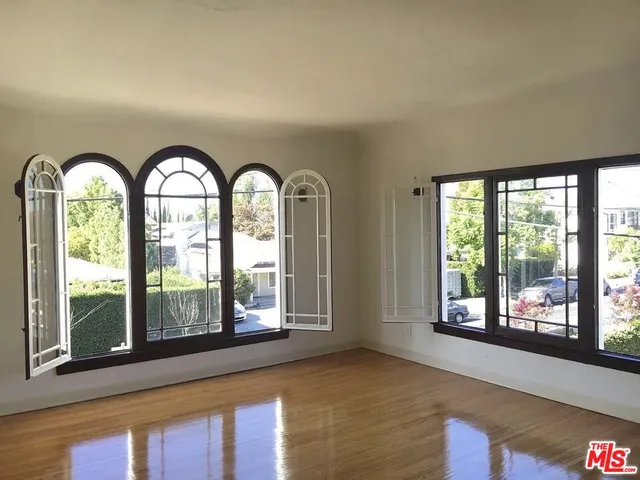 a view of an entryway with a floor to ceiling window