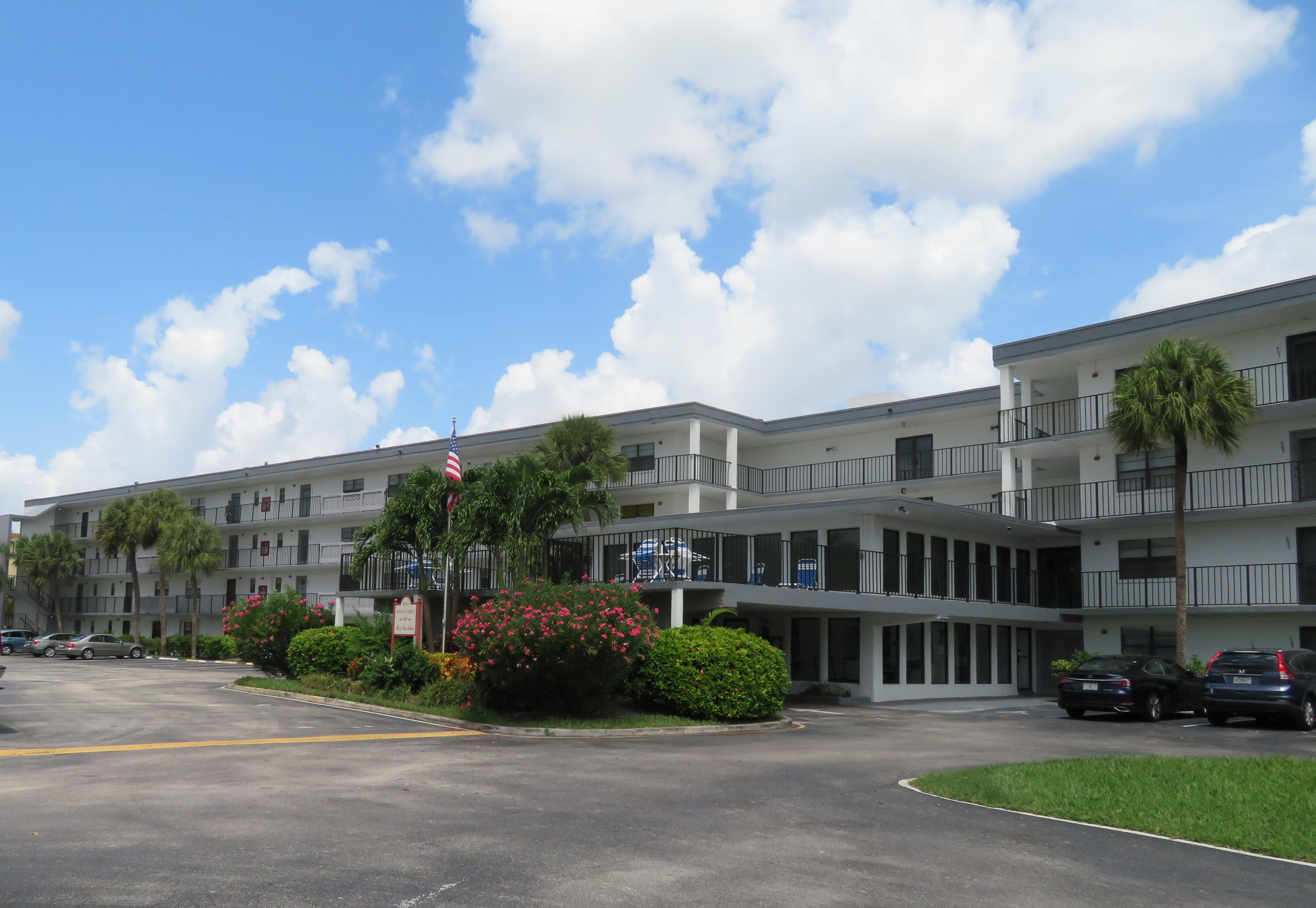 9233 Southwest 8th Street, Unit 117 Boca Raton, FL 33428 - Photo 2 of 37 2_9233_Bldg._Front_7-2023