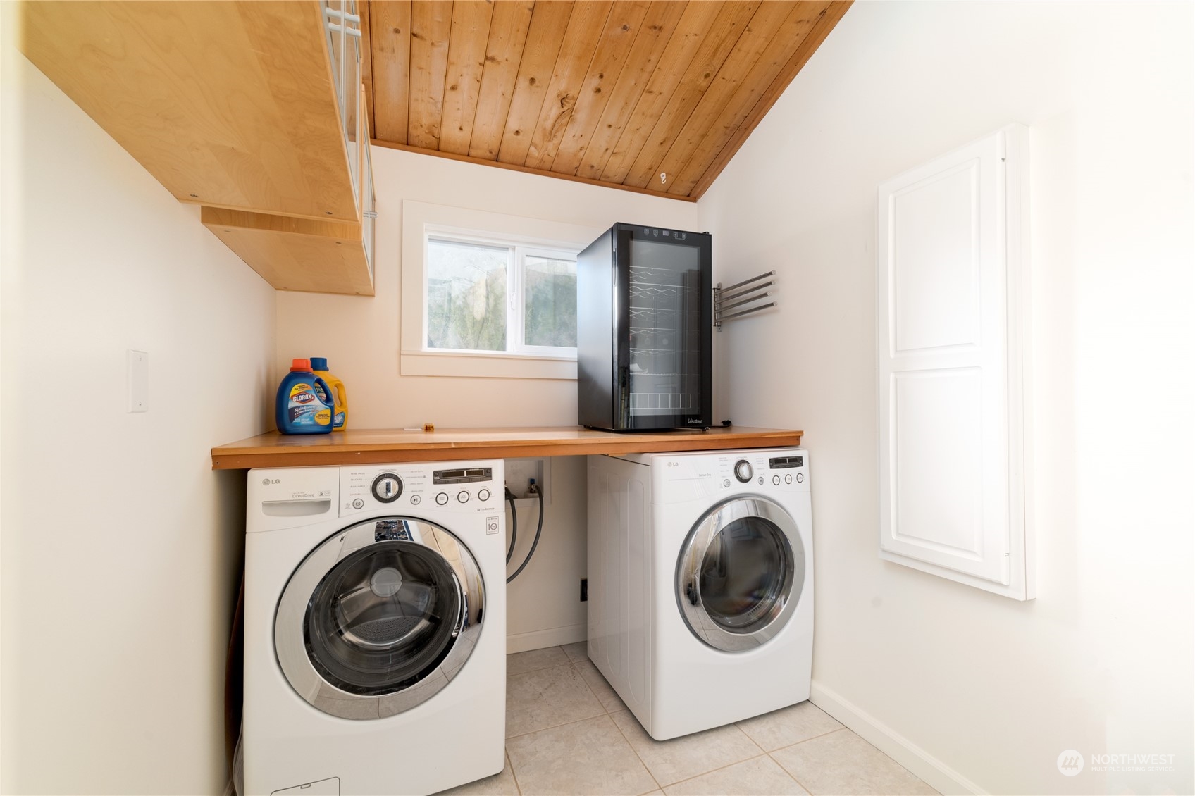 7681 Northeast North Shore Road Belfair, WA 98528 - Photo 14 of 40 a utility room with dryer and washer