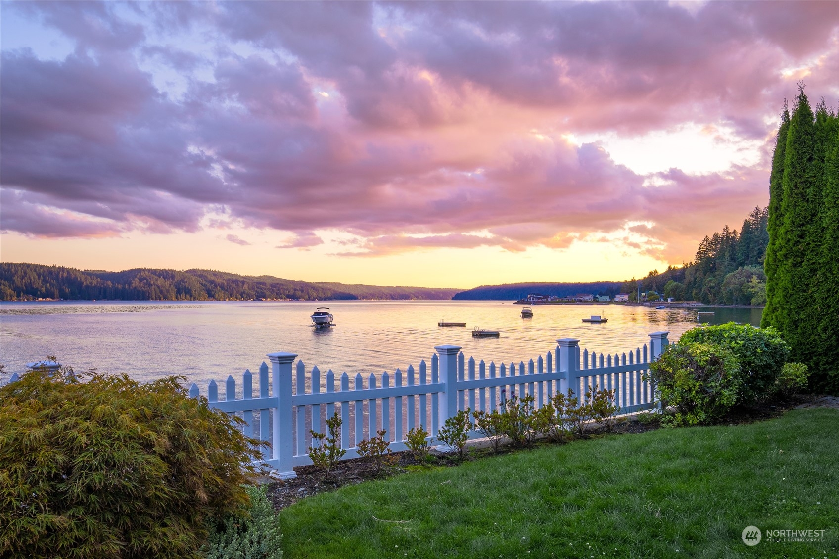 7681 Northeast North Shore Road Belfair, WA 98528 - Photo 33 of 40 a view of a patio with a lake view