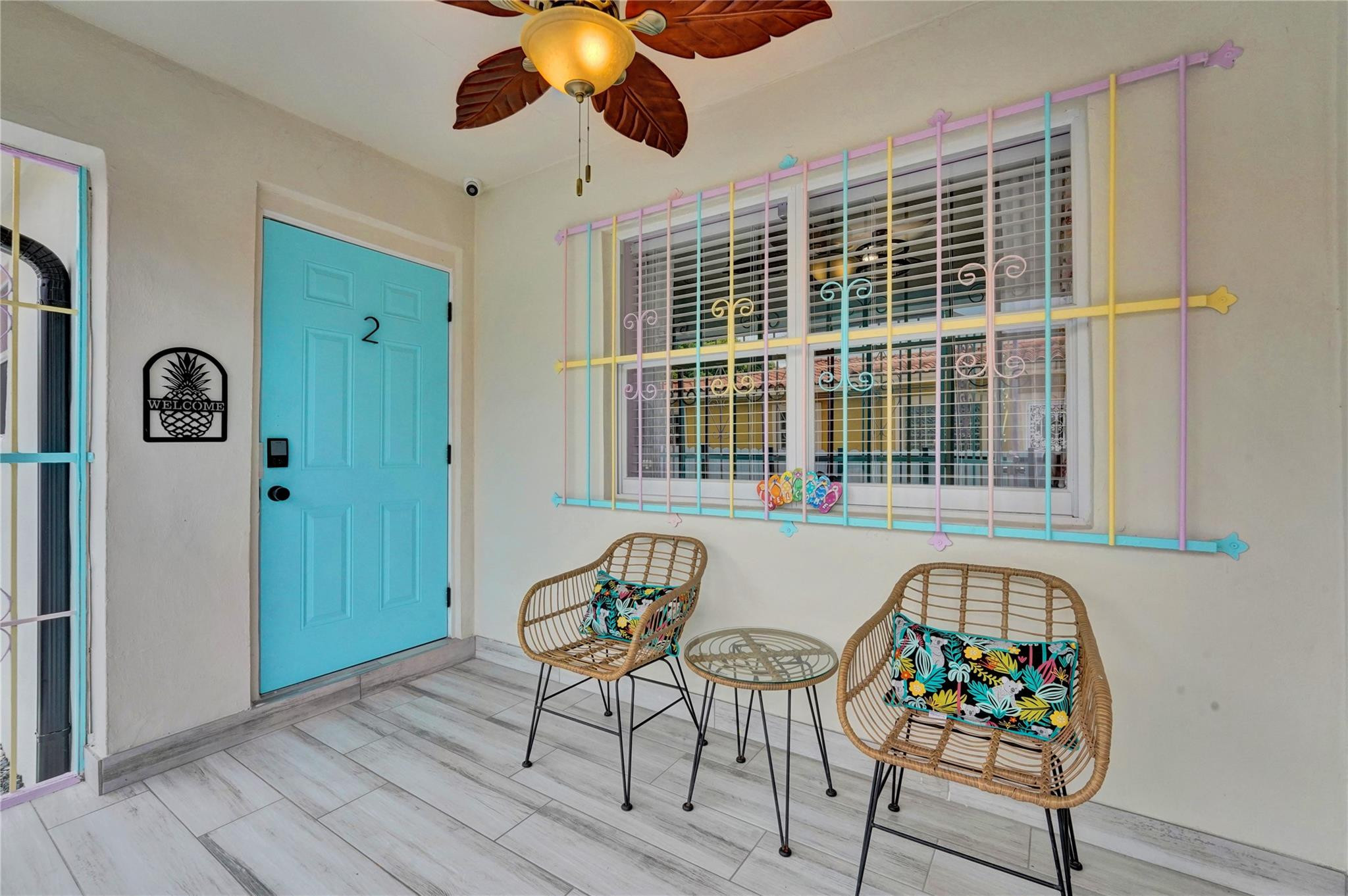 8236 Northwest 1st Place, Unit 2 Miami, FL 33150 - Photo 3 of 22 a living room with furniture and a window