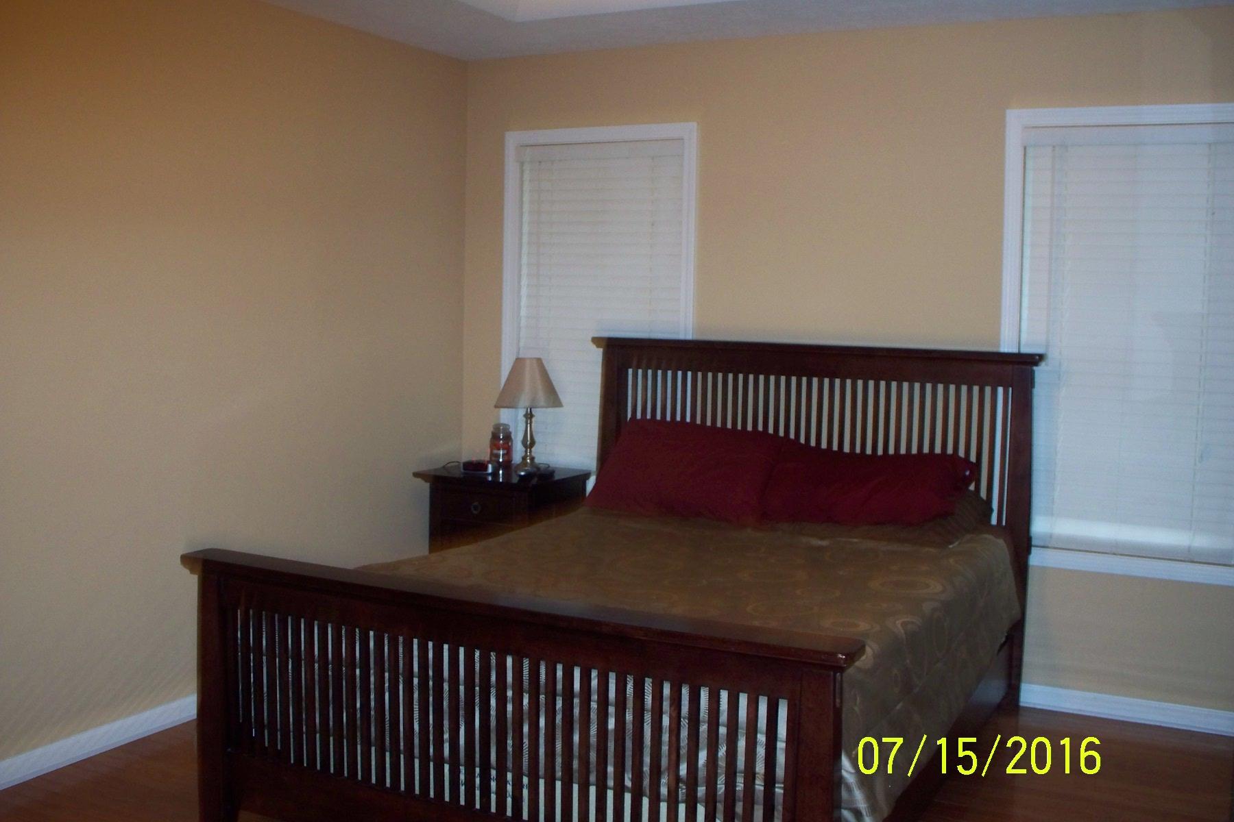 216 Foxrun Springfield, TN 37172 - Photo 12 of 21 a bed sitting in a bedroom next to a window