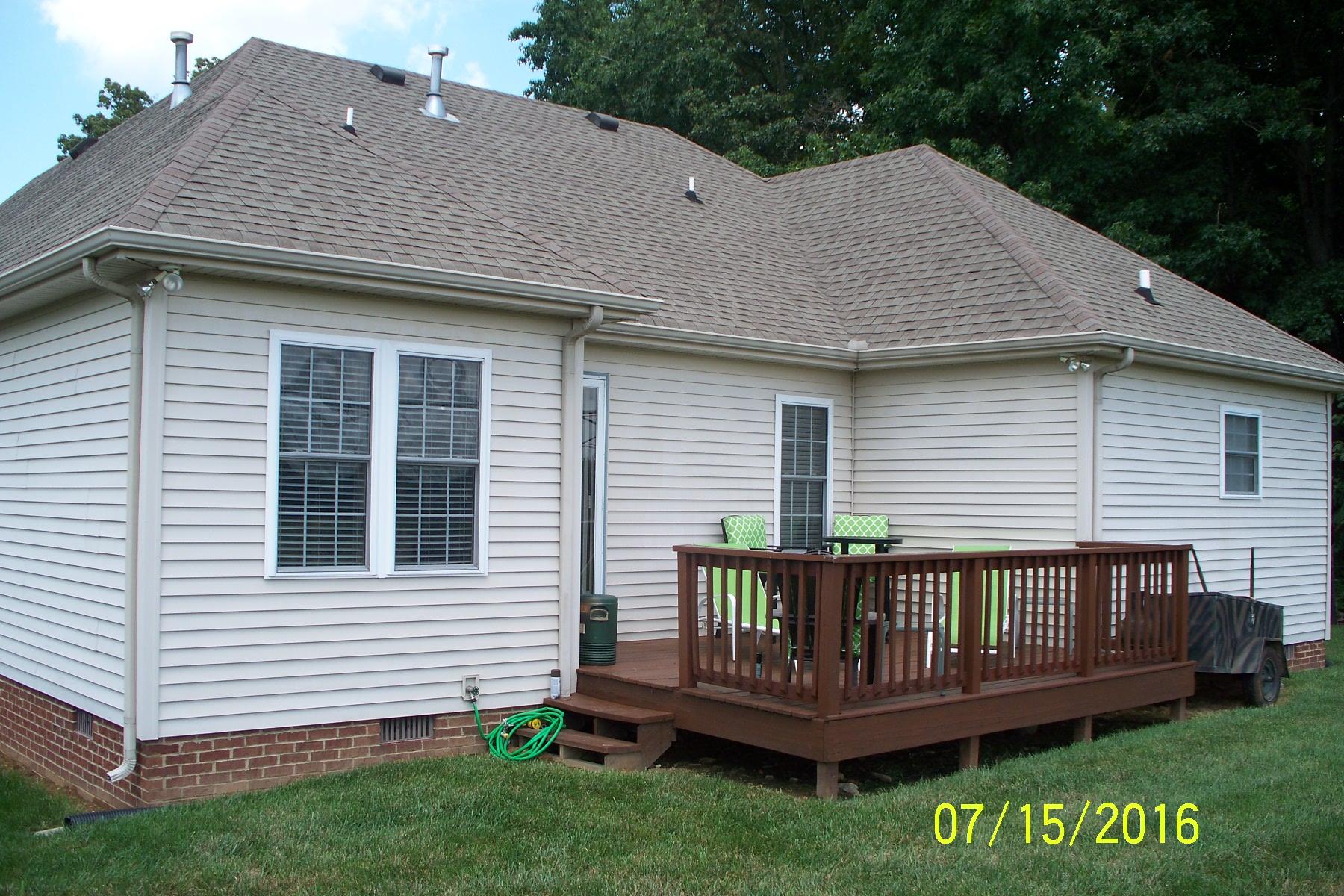 216 Foxrun Springfield, TN 37172 - Photo 20 of 21 a view of a house with a deck and a yard