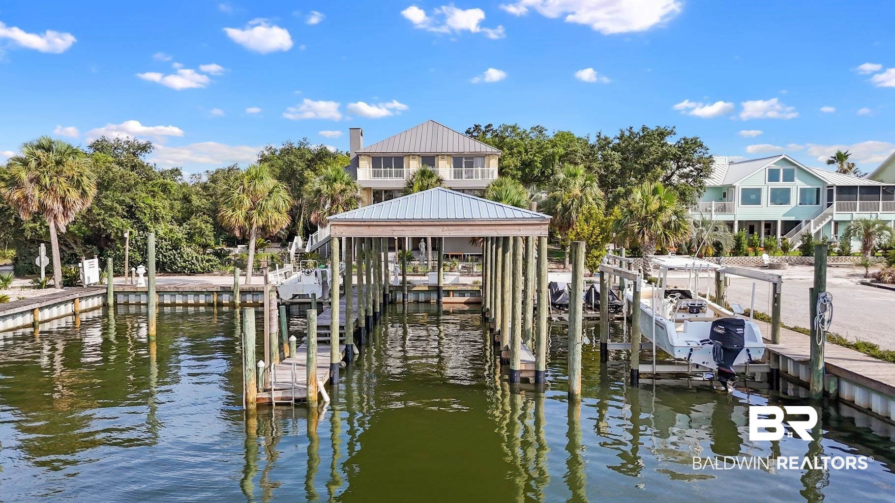 29255 Ono Boulevard Orange Beach, AL 36561 - Photo 2 of 43 Dock featuring boat lift and a water view