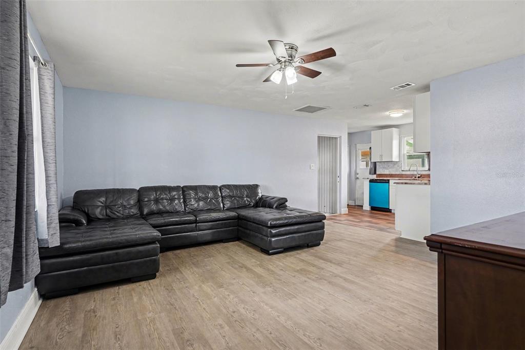 355 South Oak Avenue Frostproof, FL 33843 - Photo 14 of 35 a living room with furniture and kitchen view