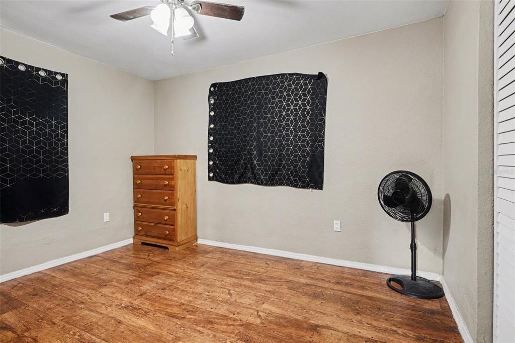 355 South Oak Avenue Frostproof, FL 33843 - Photo 16 of 35 a view of a livingroom with a staircase