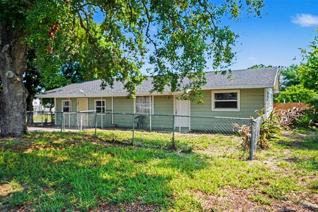 355 South Oak Avenue Frostproof, FL 33843 - Photo 2 of 35 front view of a house with a yard