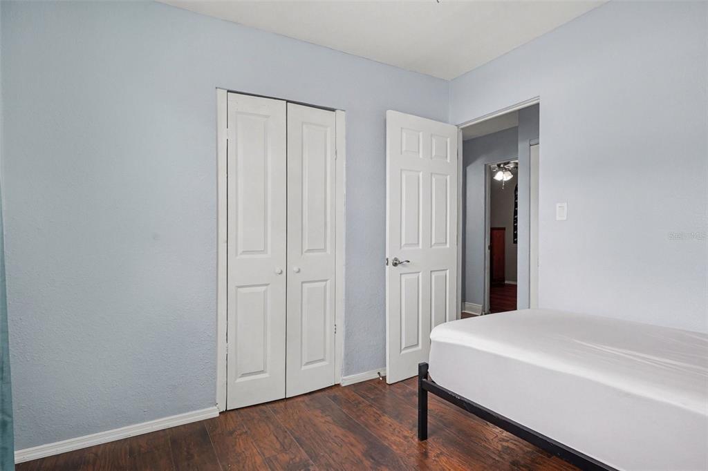 355 South Oak Avenue Frostproof, FL 33843 - Photo 24 of 35 a room that has a bed in it