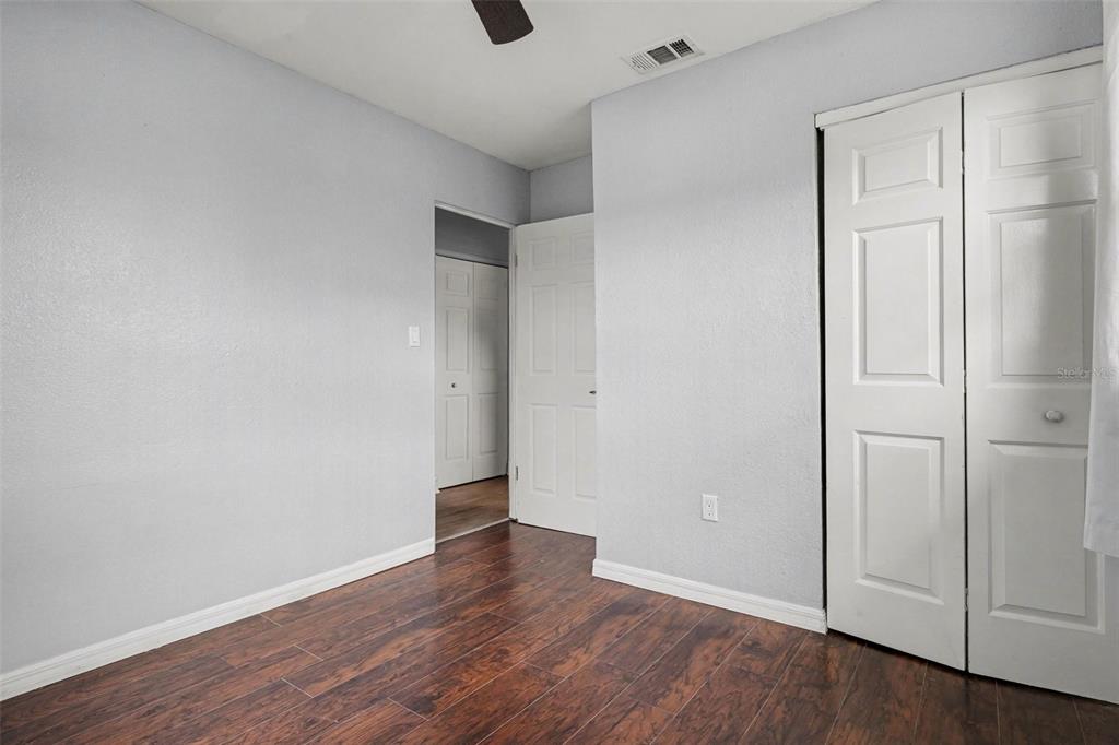 355 South Oak Avenue Frostproof, FL 33843 - Photo 27 of 35 a view of an empty room with wooden floor