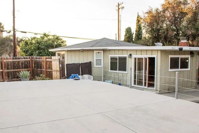 a view of a house with a swimming pool