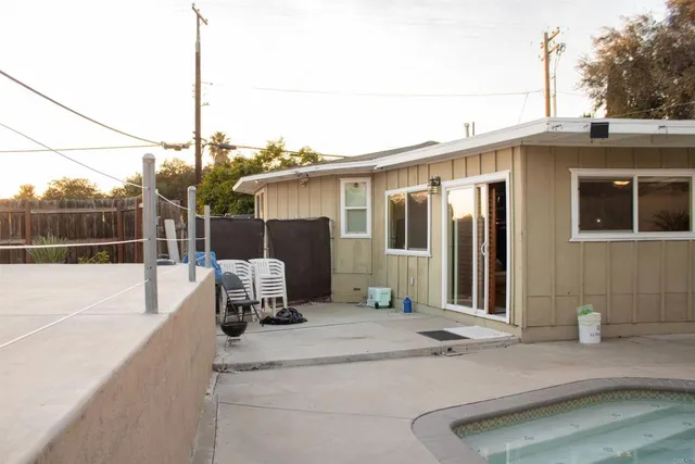 a view of outdoor space with swimming pool